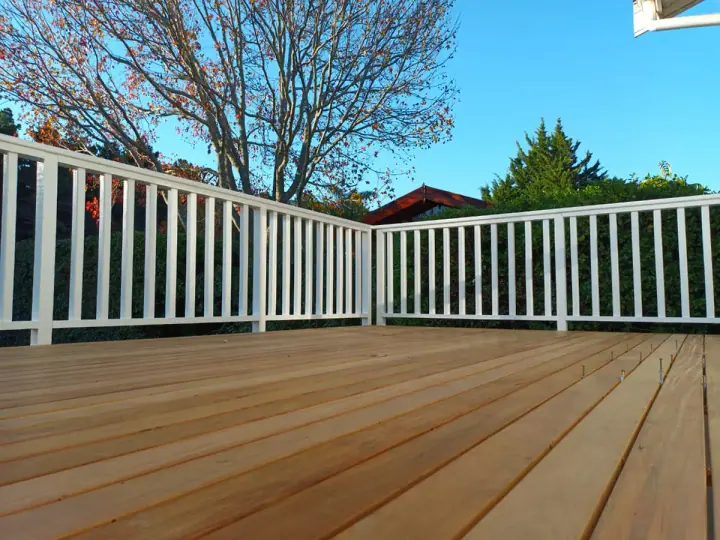 White balustrade enclosing a timber deck