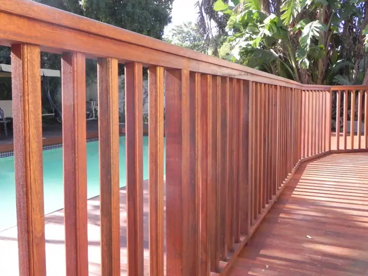 Close view of a timber balustrade along an outdoor deck