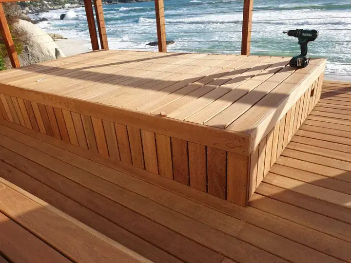 Timber cladding on the side of a raised deck