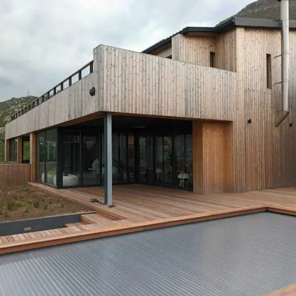 Modern home with timber cladding around the upper floor