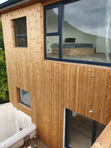 Vertical timber cladding on a house exterior