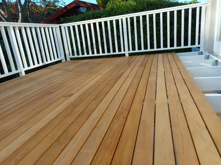 New timber decking beside a white balustrade