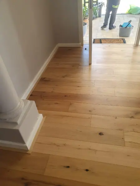 Timber flooring around a small interior corner