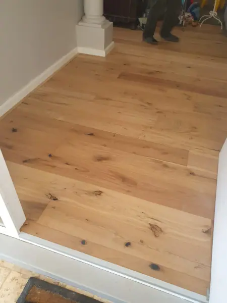 Timber flooring meeting a door threshold