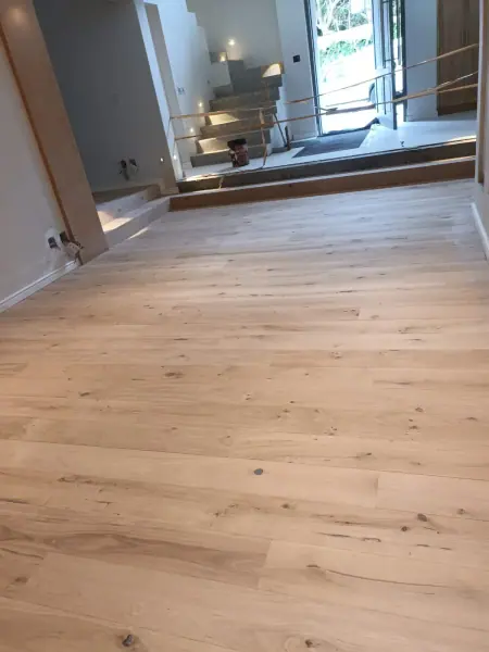 Timber flooring at a doorway and balcony entrance