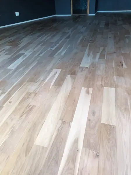 Mixed-tone timber floorboards photographed from above