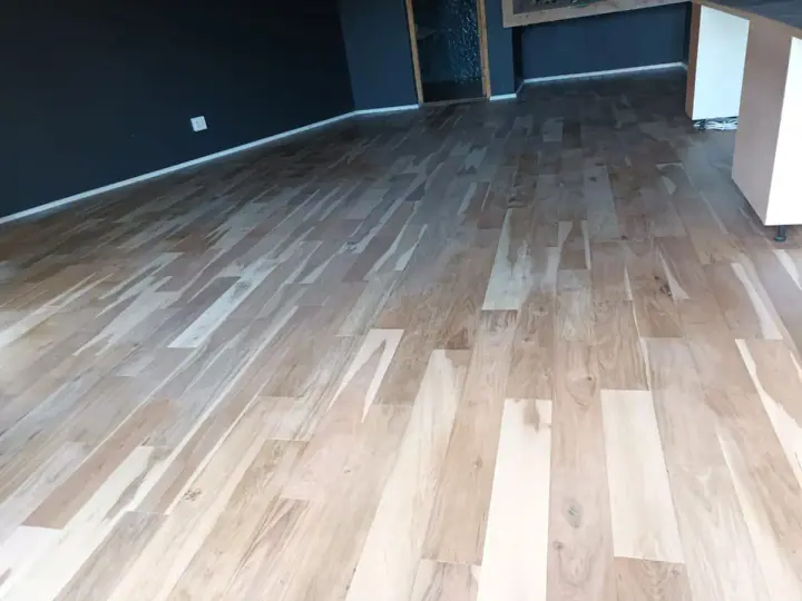 Mixed-tone timber flooring in a large open room