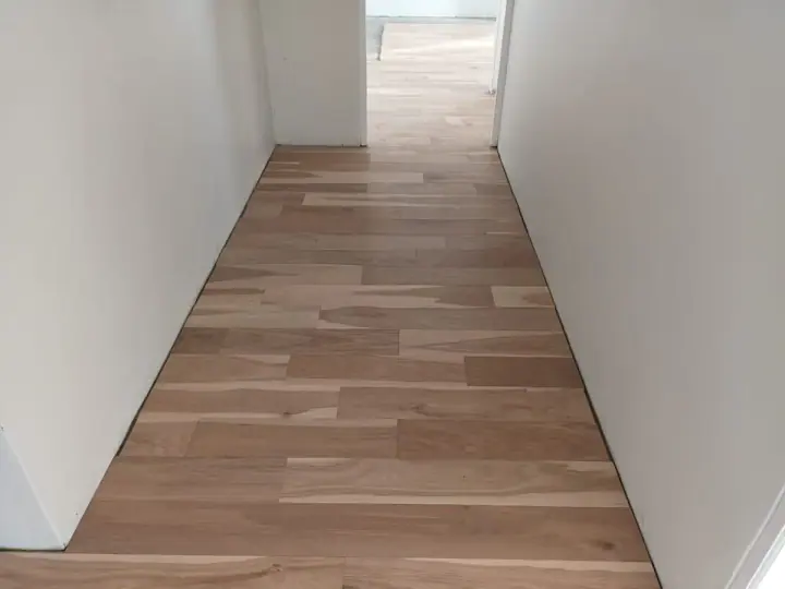Timber boards running along a narrow passage
