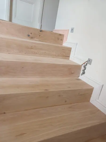 Timber stair treads wrapping around a corner