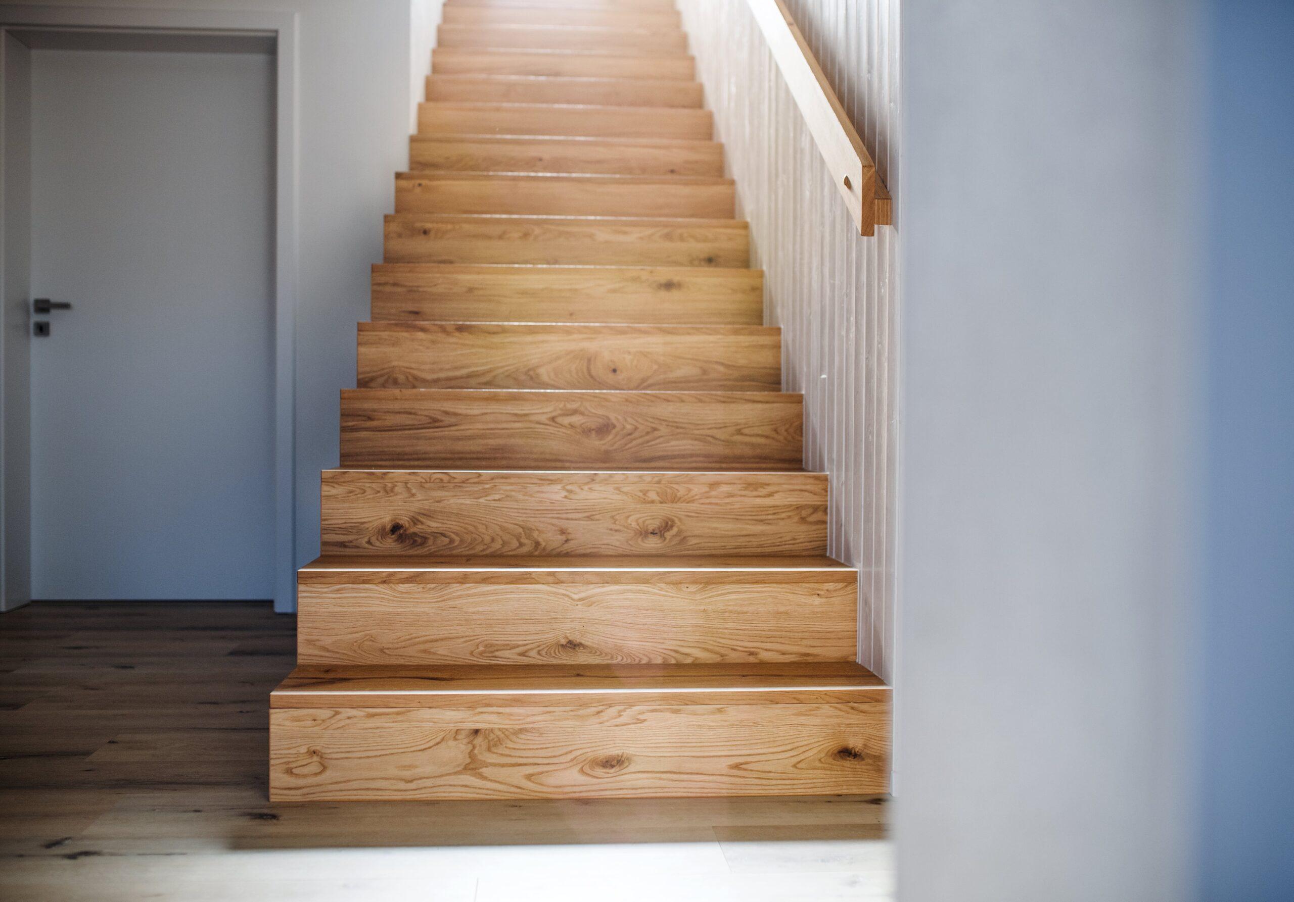 Solid timber staircase with a matching handrail